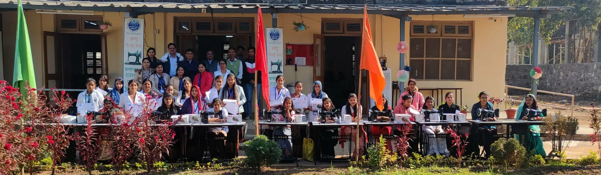 Rows of women training on sewing machines at a PURE India Trust skill centre