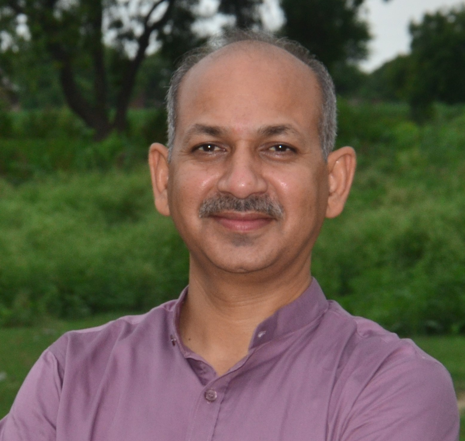 Founder of PURE India Trust standing outdoors